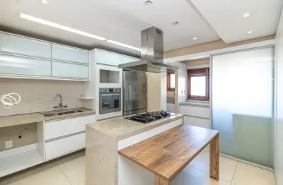 Cobertura com vista para o guaíba de 3 dormitórios sendo uma suíte 2 vagas de garagem