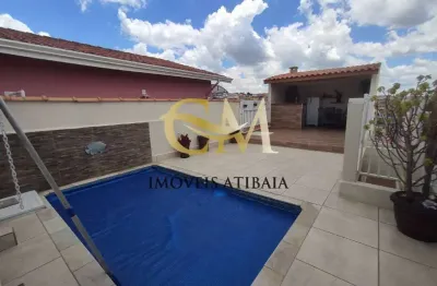 Casa com piscina em  atibaia, localizada no bairro alvinópolis.