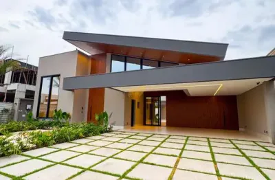 Luxuosa casa térrea no condomínio supremo itália: 4 suítes, espaço gourmet, piscina e automação em cuiabá/mt!