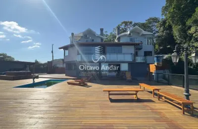 Casa de alto padrão com vista panorâmica para o mar – 4 suítes e 500m² construídos