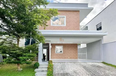 Casa duplex com 3 suítes e 4 vagas no condomínio jardins do lago.