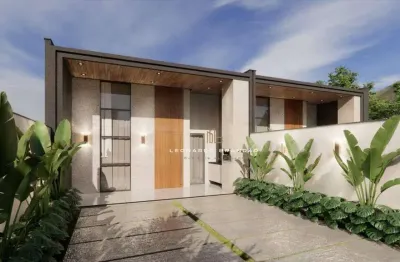 Casa plana, nascente com 03 suítes mais lavabo com 02 vagas de garagem.