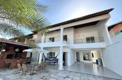 Casa duplex com 4 suítes, 6 vagas e lazer privativo.