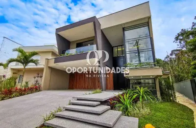 Casa à venda com 460m² de área construída, 5 suítes, em riviera de são lourenço bertioga sp.