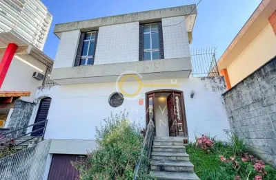 Casa com 4 dormitórios para alugar, 386 m² por r$ 12.000,00/mês - boqueirão - santos/sp