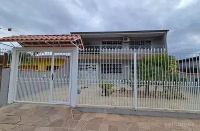 Casa com 3 quartos à venda na rua gaspar martins, 894, americana, alvorada, 186 m2 por r$ 550.000
