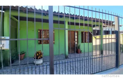 Casa com 2 quartos à venda na plauto azambuja, 225, maringá, alvorada, 76 m2 por r$ 297.000