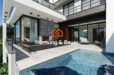Casa de luxo com piscina e suíte master em colina do sol, campo bom