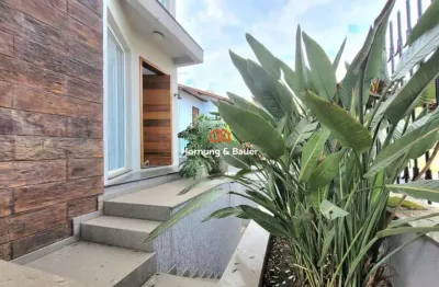 Casa mobiliada à venda em campo bom, bairro firenze! com piscina aquecida, suíte master e sauna