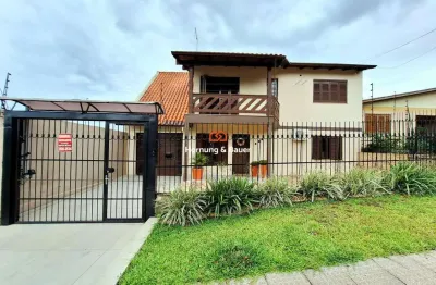 Casa com 4 dormitórios e piscina à venda em novo hamburgo, bairro petrópolis.