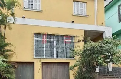 Amplo sobrado com quintal, edícula e 4 vagas no jardim da bandeiras.