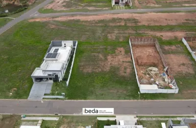 Ibeda - terreno condomínio jardins amsterdã 495m2, laser, quitado e escriturado