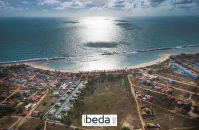 Ibeda - terreno em condomínio praia de tabatinga 100metros praia com 220m2 plano