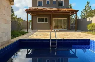 Casa de alto padrão com piscina e 3 suítes no condomínio vintage – granja viana