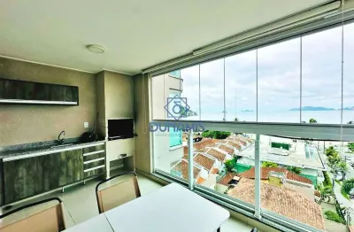 Apartamento  a venda na praia da enseada com sacada gourmet e vista para o mar