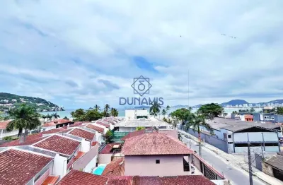 Apartamento a venda na praia da enseada com sacada gourmet e vista para o mar