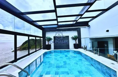 Cobertura finamente reformada e mobiliada à venda na praia da enseada Guarujá