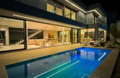 Casa de condomínio com 540 m², 4 quartos sendo 4 suítes à venda em alphaville.