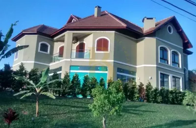 Casa de condomínio com 480 m², 3 quartos sendo 2 suítes à venda no bairro res. morada dos lagos.