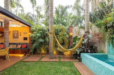 Linda casa em condomínio fechado, com espaço gourmet e um quintal convidativo localizado no jardim c