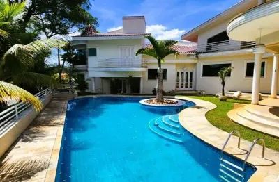 Casa e venda em alphaville 12, 4 suítes (4 quartos), com quintal verdejante e charmoso espaço da piscina