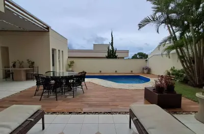 Casa a venda em alphaville genesis 1 um, com mobiliário fixo e solto, 4 quartos (4 suíte)