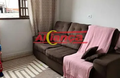 Prédio Residencial com 5 Casas + Salão Comercial / Pronto para Investir em Guarulhos!