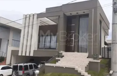 Casa com 4 quartos, 4 suítes, 2 banheiros, e 3 vagas de garagem. codigo: 13712