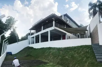 Vendo belíssima casa em mairiporã de frente para represa !!