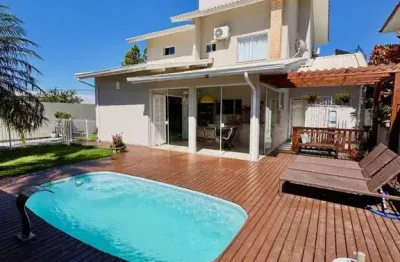 Casa em condomínio fechado com 3 quartos à venda na rua prefeito ari wagner, 2, centro, palhoça por r$ 1.380.000