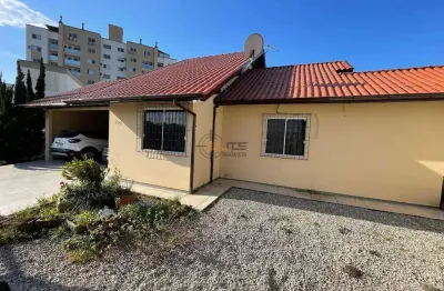 Casa com 4 quartos à venda na rua trento, 100, pagani, palhoça por r$ 1.060.000