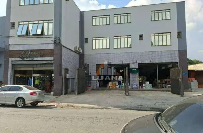 Predio com 2 lojas e deposito com 8 vagas de garagem em rua comercial defronte agencia do bradesco da vila jaguara.