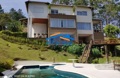 Linda casa em condomínio refúgio dos pinheiros 4 suítes!