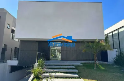 Casa em condomínio a venda sendo 4 suítes, 7 vagas no villa solaia.