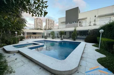 Linda casa no condomínio lorian boulevard com 5 suítes, lazer formidável!!!
