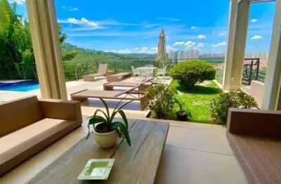 Casa espetacular com 5 suítes em tamboré 10: luxo e comodidade garantidos!