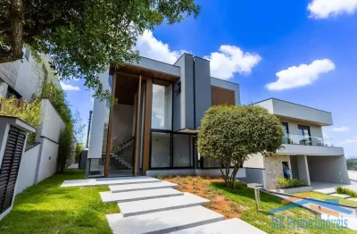 Casa em condomínio 550m² com 4 suítes no genesis ii.