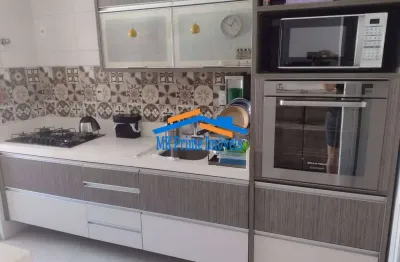 Apartamento de 91m² com 3 dormitórios, suíte e 2 vagas de garagem.