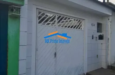 Excelente sobrado com 4 dormitórios sendo 1 suíte, 4 vagas de garagem.