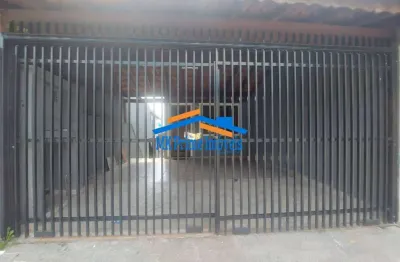 Casa com 4 quartos sendo 2 suítes e 2 vagas de garagem.