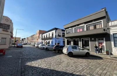 Casa e sala comercial de esquina na baía da babitonga à venda