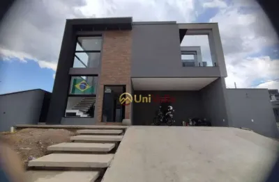 Sobrado com 4 dormitórios, 210 m² - venda por r$ 1.800.000,00 ou aluguel por r$ 8.580,00/mês - condomínio reserva aruanã - são josé dos campos/sp