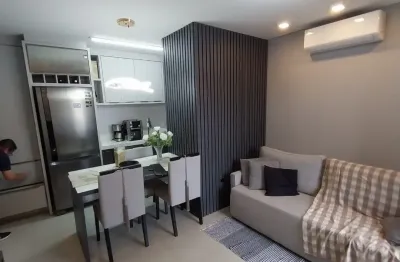 Apartamento 2 quartos com moveis planejados,sacada com churrasqueira.