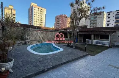 Casa isolada em praia grande sp para alugar 3 quartos sendo 1 suíte e piscina.