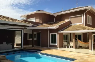 Luxuosa casa no condomínio alphaville 1 campinas para locação - 5 suítes, piscina, sauna e jacuzzi