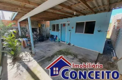 C91 - residência com anexo localizada em região de moradores
