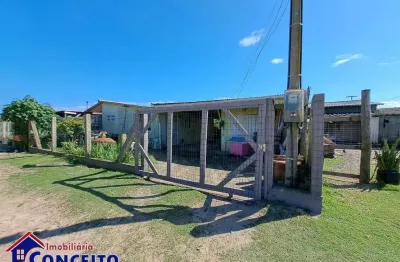 C180  - residência de madeira localizada em região de moradores