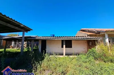 C490 - residência localizada em avenida no balneário albatroz