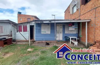 C37 - residência de madeira com 2 dormitórios em região de moradores