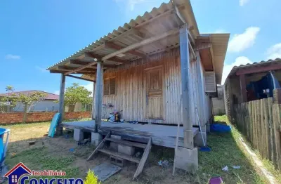 C628 - Chalé localizado em região de moradores no Balneário Albatroz